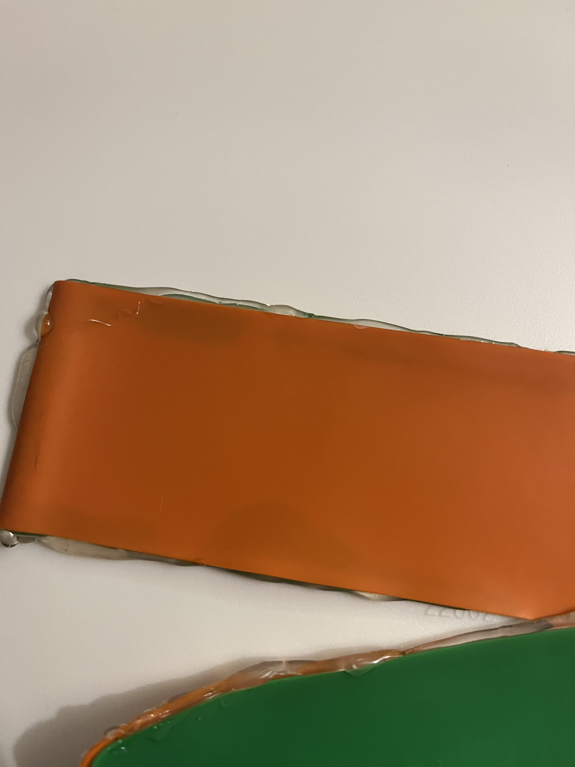 While gluing the pieces together, I didn’t realize how challenging it would be to get them to properly stick. I applied glue along the edges and then pressed them together, but even after reinforcing the seams, the glue wouldn’t hold consistently. This may have been due to the plasticky material, but it made the process much more time-consuming than expected. I also had to wait for each section to fully dry before moving on, since touching it too soon would pull apart the glue that hadn’t set yet, making the whole process slow and repetitive.